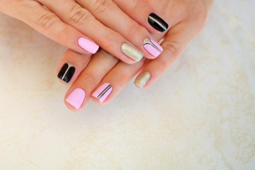 Natural nails, gel polish. Perfect clean manicure with zero cuticle. Nail art design for the fashion style.